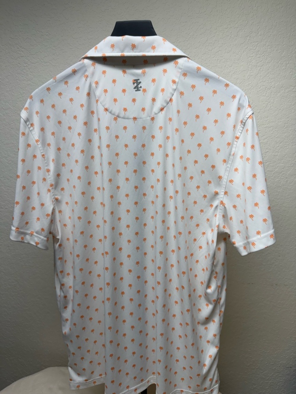 Izod White Short-Sleeve Polo with Orange Palm Print